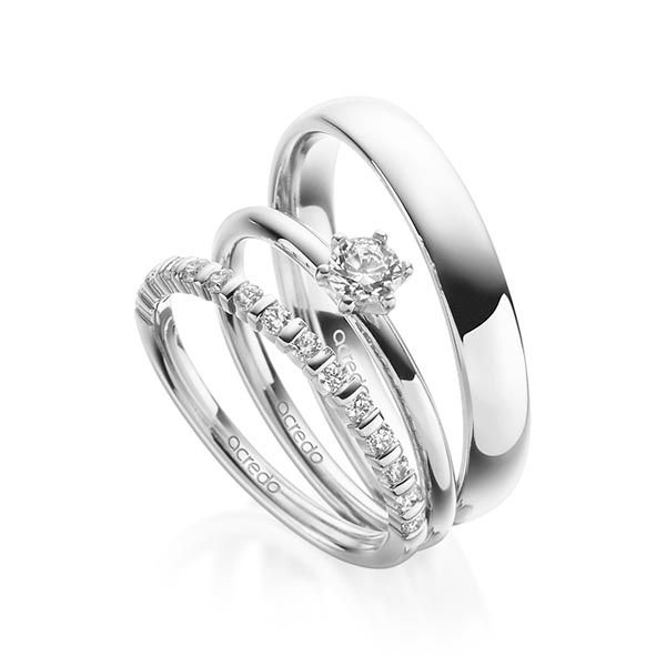 Triset in witgoud 14 kt. half gezet met in totaal 0,55 ct. Briljant tw,vs tw/si van acredo