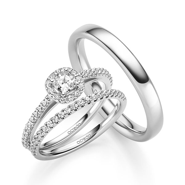 Triset in witgoud 14 kt. met 0,3 ct. + in totaal 0,504 ct. Briljant tw,vs tw/si van acredo