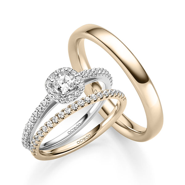 Triset in witgoud 14 kt. met 0,3 ct. + in totaal 0,504 ct. Briljant tw,vs tw/si van acredo