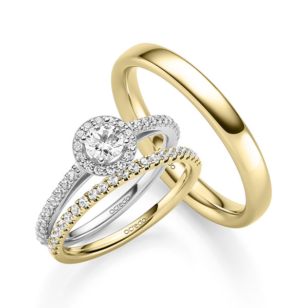 Triset in witgoud 14 kt. met 0,3 ct. + in totaal 0,518 ct. Briljant tw,vs tw/si van acredo