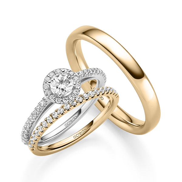 Triset in witgoud 14 kt. met 0,3 ct. + in totaal 0,518 ct. Briljant tw,vs tw/si van acredo