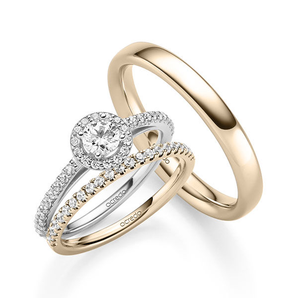 Triset in witgoud 14 kt. met 0,3 ct. + in totaal 0,518 ct. Briljant tw,vs tw/si van acredo