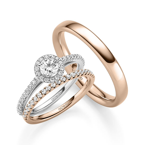 Triset in witgoud 14 kt. met 0,3 ct. + in totaal 0,518 ct. Briljant tw,vs tw/si van acredo