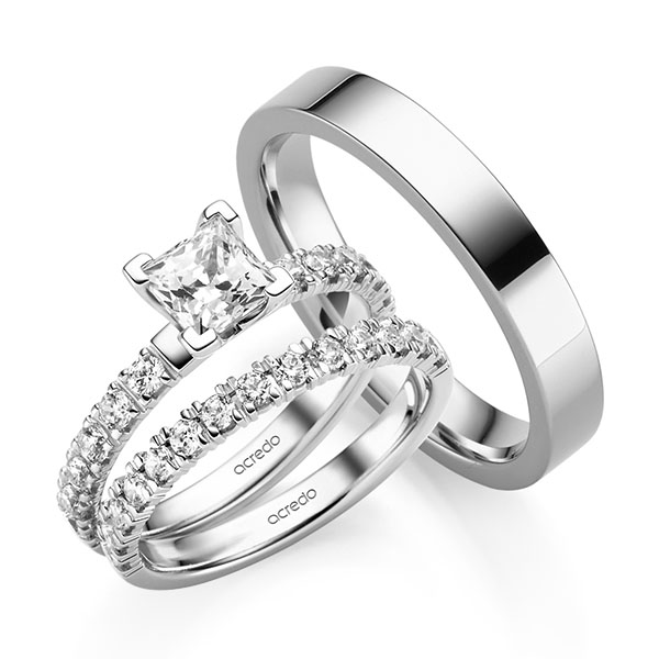 Triset in witgoud 14 kt. met 0,7 ct. + in totaal 0,93 ct. Princess-Diamant & Briljant tw,vs tw/si van acredo