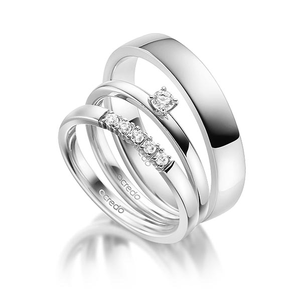 Triset in witgoud 14 kt. met in totaal 0,25 ct. Briljant tw,vs tw/si van acredo