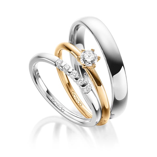 Triset in witgoud 14 kt. met in totaal 0,35 ct. Briljant tw,vs tw/si van acredo
