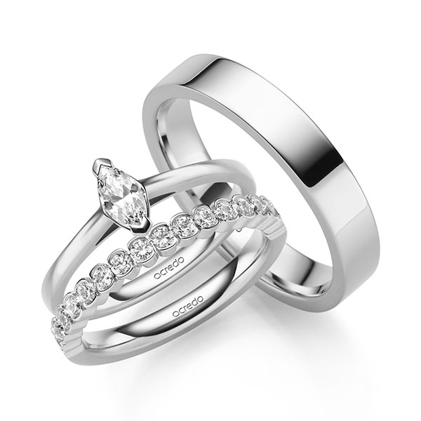 Triset in witgoud 14 kt. met in totaal 0,71 ct. Briljant tw,vs tw/si van acredo